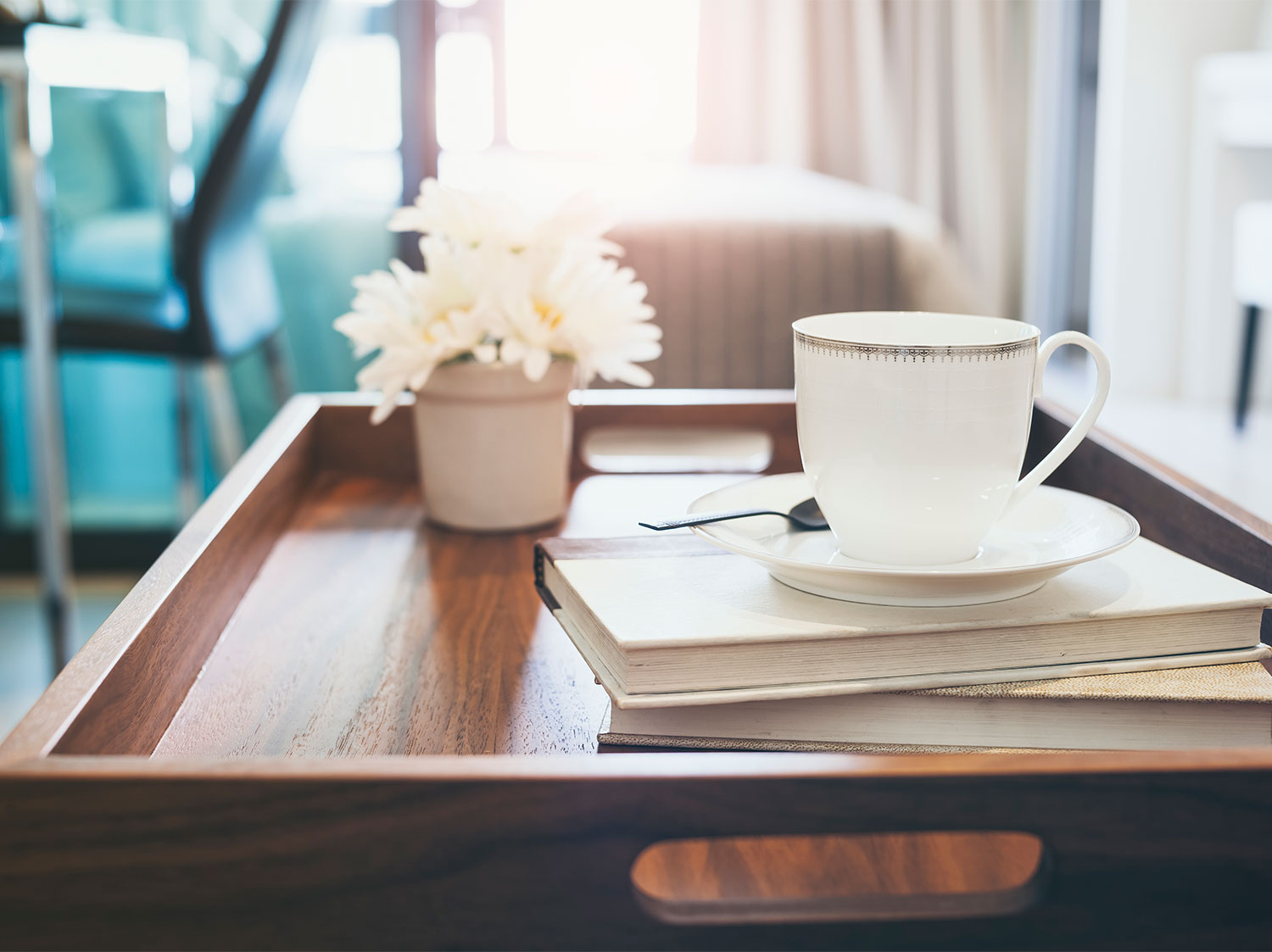 coffee table with mug and books